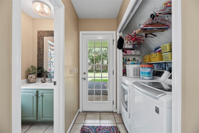 7615 Sandygate Ln, Houston, TX 77095 - laundry area featuring separate washer and dryer and light tile patterned floors