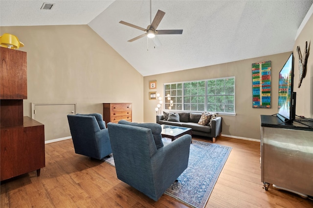 7615 Sandygate Ln, Houston, TX 77095 - living area with a ceiling fan, wood finished floors, and high vaulted ceiling