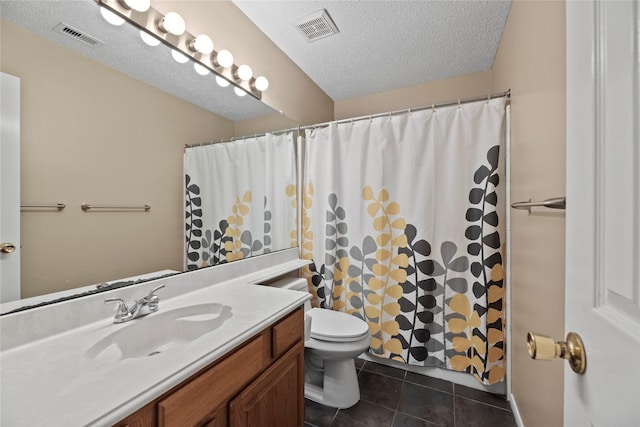 7615 Sandygate Ln, Houston, TX 77095 - bathroom featuring vanity, tile patterned flooring, a textured ceiling, and curtained shower
