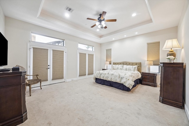 961 Queen Annes Rd, Houston, TX 77024 - bedroom featuring a raised ceiling, light colored carpet, recessed lighting, a ceiling fan, and french doors