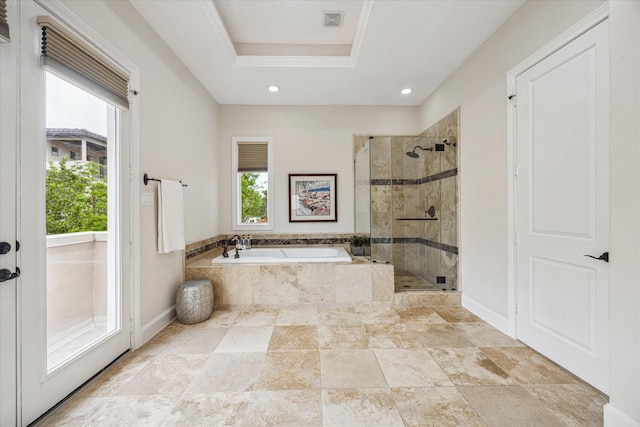 961 Queen Annes Rd, Houston, TX 77024 - full bathroom featuring healthy amount of natural light, a bath, a shower stall, a tray ceiling, and recessed lighting