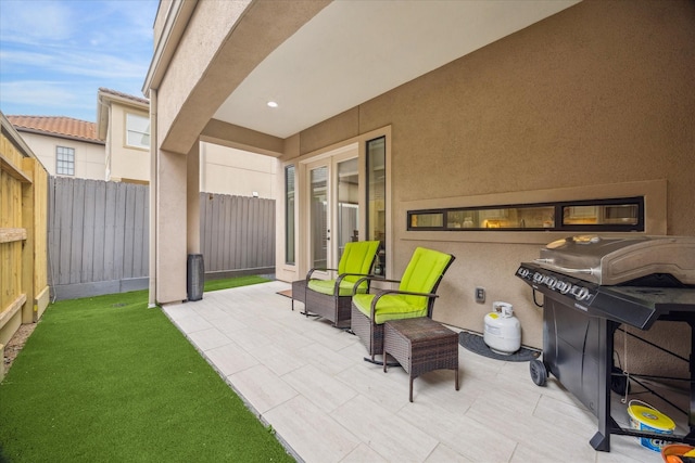 961 Queen Annes Rd, Houston, TX 77024 - view of patio with a grill