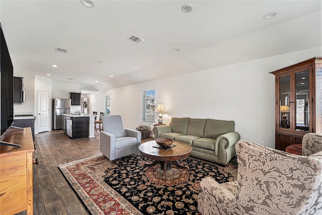 16862 Short Pines Dr, Conroe, TX 77302 - living area featuring dark wood-style floors, lofted ceiling, and recessed lighting