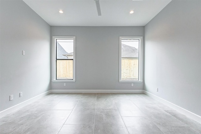 6522 Westview Dr, Houston, TX 77055 - unfurnished room featuring plenty of natural light, concrete flooring, and recessed lighting