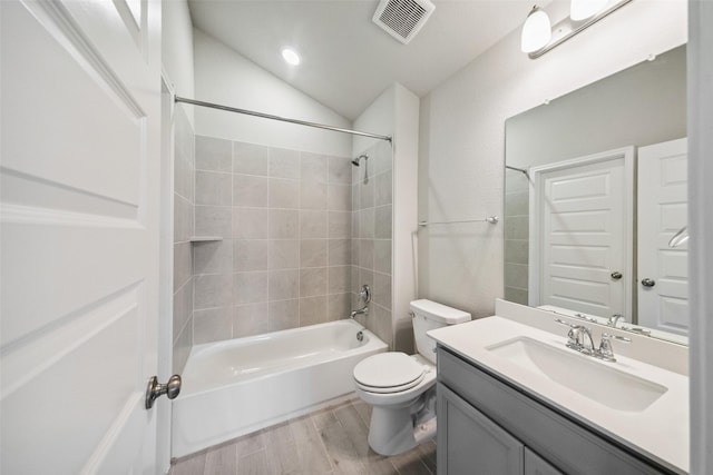 4805 Magnolia Springs Dr, Pearland, TX 77584 - bathroom featuring wood finished floors, vanity,  shower combination, and vaulted ceiling
