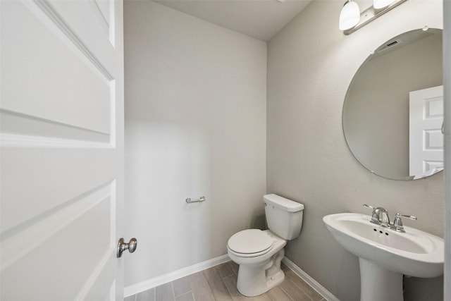 4805 Magnolia Springs Dr, Pearland, TX 77584 - bathroom featuring toilet and wood finished floors