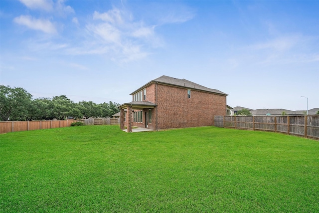 4805 Magnolia Springs Dr, Pearland, TX 77584 - fenced backyard featuring a patio area
