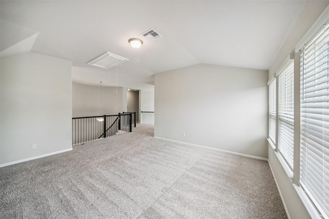4805 Magnolia Springs Dr, Pearland, TX 77584 - unfurnished room with attic access, vaulted ceiling, and carpet floors