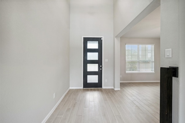 4805 Magnolia Springs Dr, Pearland, TX 77584 - entryway featuring light wood-style flooring and baseboards