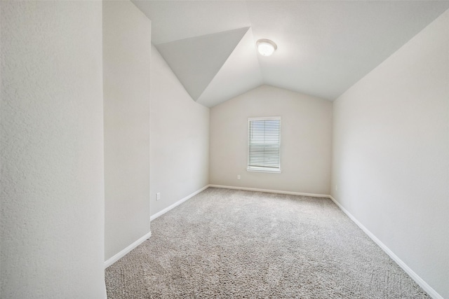 4805 Magnolia Springs Dr, Pearland, TX 77584 - additional living space featuring carpet floors and vaulted ceiling