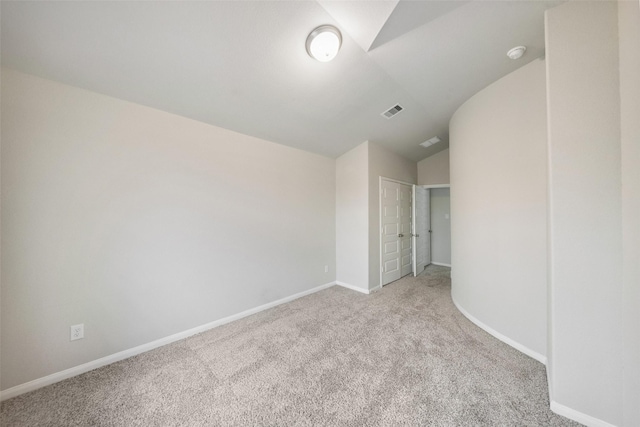 4805 Magnolia Springs Dr, Pearland, TX 77584 - unfurnished bedroom featuring vaulted ceiling and light colored carpet