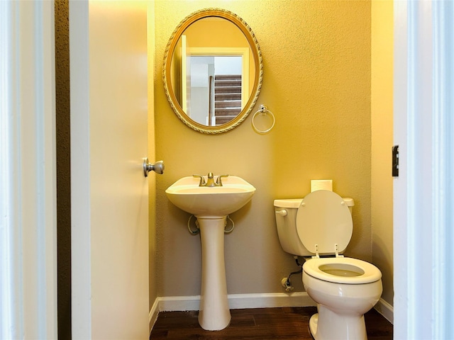 2802 Grants River Cir, Sugar Land, TX 77479 - bathroom with toilet and wood finished floors