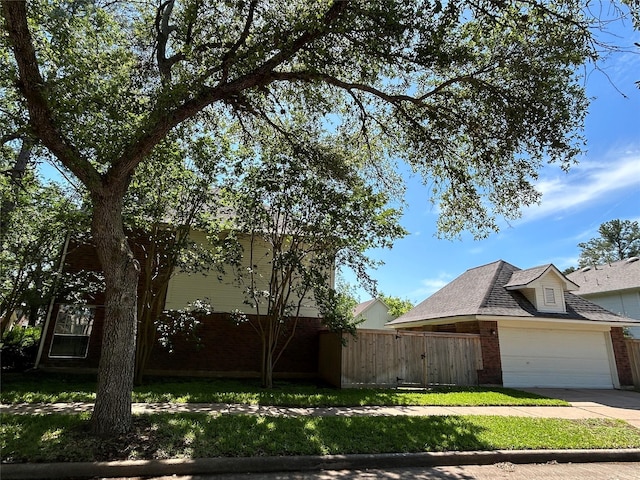 2802 Grants River Cir, Sugar Land, TX 77479 - view of home's exterior featuring brick siding, driveway, and an attached garage