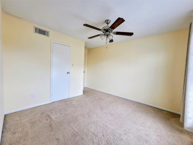 1515 Sandy Springs Rd Unit 1903, Houston, TX 77042 - unfurnished bedroom featuring carpet, ceiling fan, and a textured ceiling