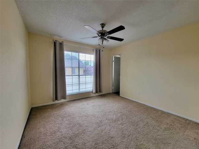 1515 Sandy Springs Rd Unit 1903, Houston, TX 77042 - carpeted empty room featuring ceiling fan and a textured ceiling
