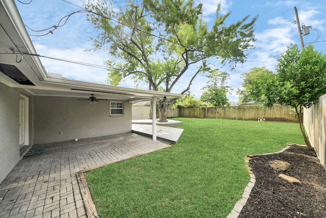 2215 Gardenia Dr, Houston, TX 77018 - fenced backyard featuring a ceiling fan and a patio area