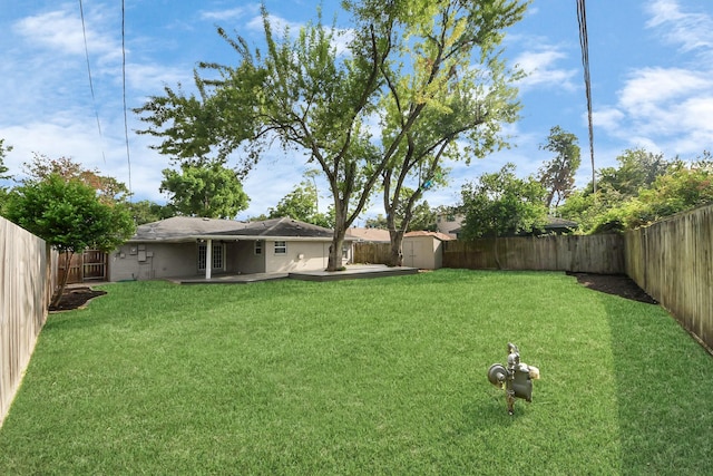 2215 Gardenia Dr, Houston, TX 77018 - fenced backyard with a storage unit