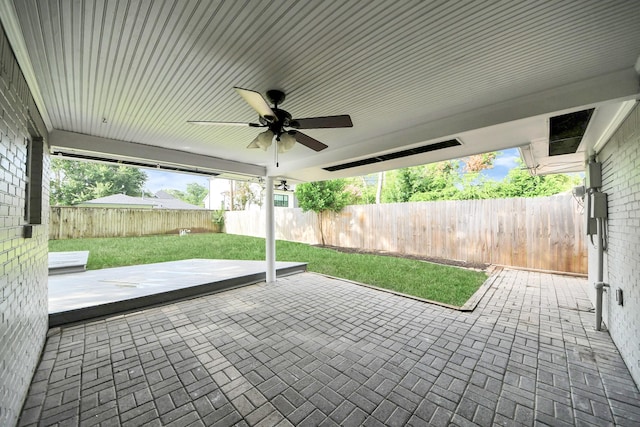 2215 Gardenia Dr, Houston, TX 77018 - fenced backyard with a patio and a ceiling fan