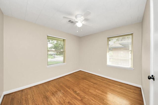 2215 Gardenia Dr, Houston, TX 77018 - spare room with wood finished floors and ceiling fan