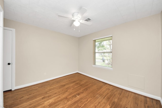 2215 Gardenia Dr, Houston, TX 77018 - empty room with wood finished floors and ceiling fan