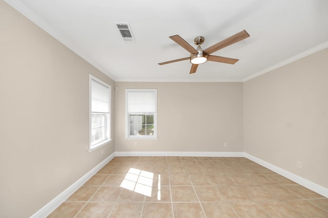 2215 Gardenia Dr, Houston, TX 77018 - spare room with ornamental molding, a ceiling fan, and light tile patterned floors