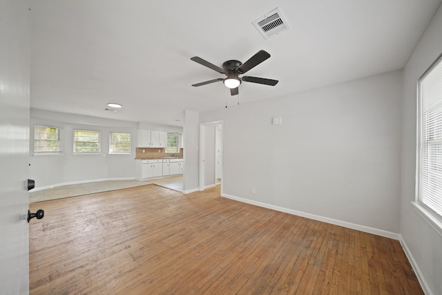 2931 Barksdale Dr, Houston, TX 77093 - unfurnished living room featuring ceiling fan and light wood-style floors
