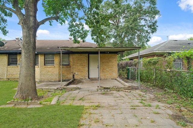 2931 Barksdale Dr, Houston, TX 77093 - rear view of house featuring a patio area and brick siding