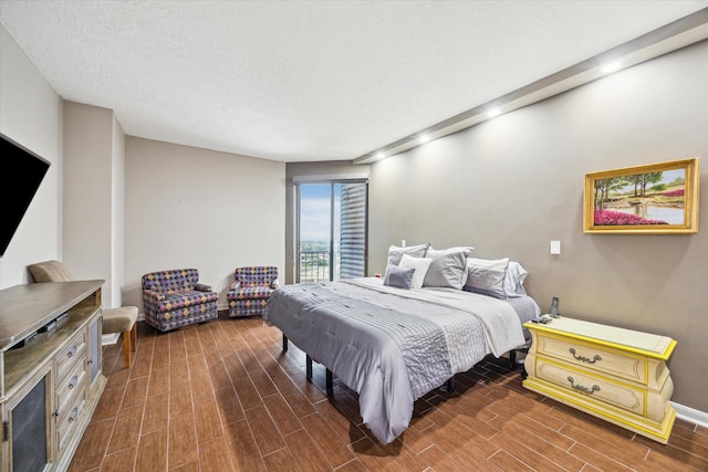 3350 Mccue Rd Unit 1504, Houston, TX 77056 - bedroom with dark wood-type flooring