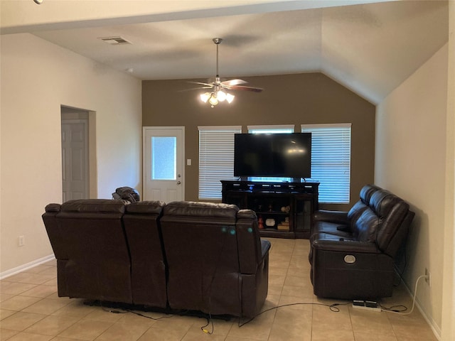 12223 Zenith Ridge Way, Humble, TX 77346 - living area with light tile patterned flooring, vaulted ceiling, and a ceiling fan