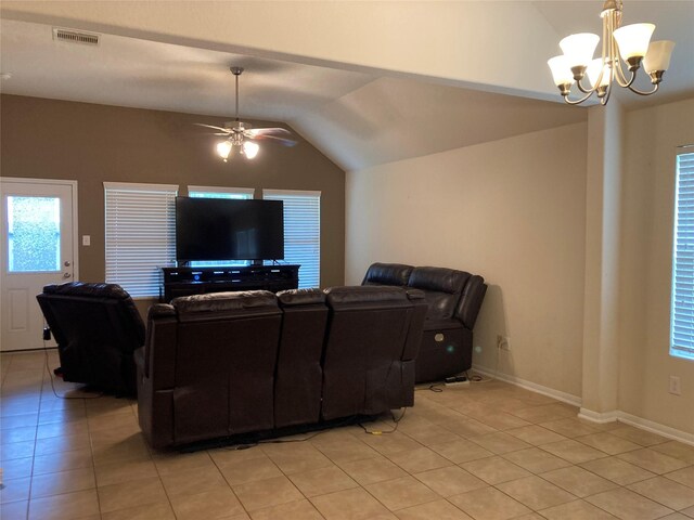 12223 Zenith Ridge Way, Humble, TX 77346 - living area with light tile patterned floors, a chandelier, vaulted ceiling, and ceiling fan