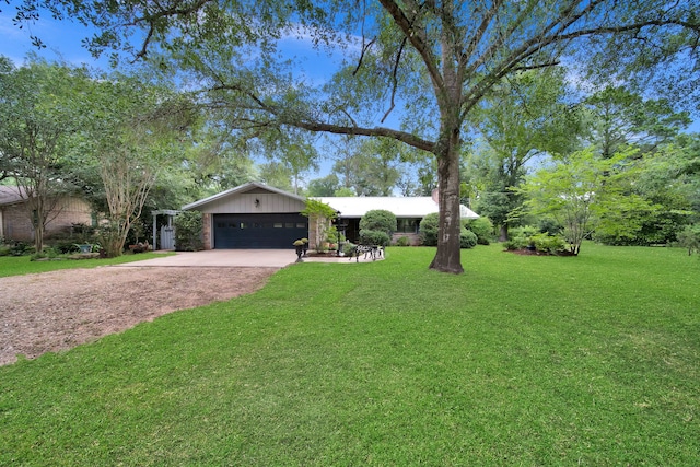 2970 Spanish Oaks Dr, Brenham, TX 77833 - ranch-style house featuring driveway, a front lawn, and a garage