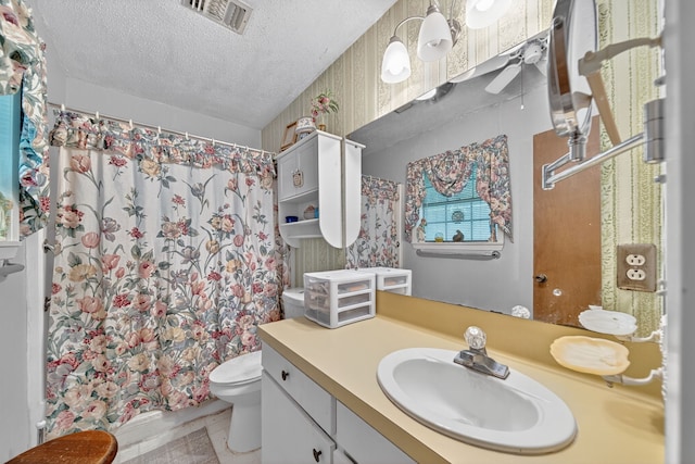 2970 Spanish Oaks Dr, Brenham, TX 77833 - bathroom with vanity, a textured ceiling, and a shower with curtain