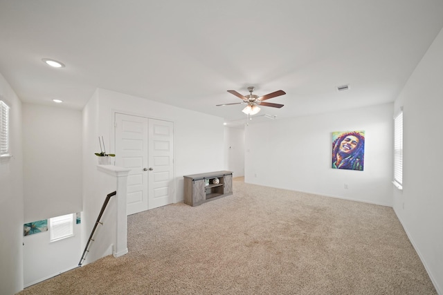 5958 First Blush Dr, Katy, TX 77493 - unfurnished living room with carpet floors, recessed lighting, and a ceiling fan