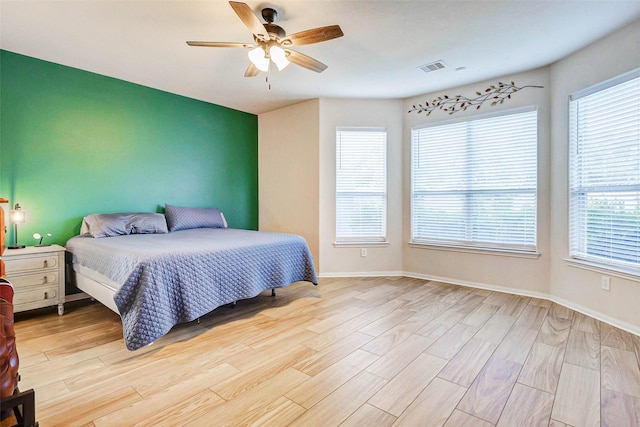 2961 Autumn Brook Ln, League City, TX 77573 - bedroom featuring wood finished floors and ceiling fan