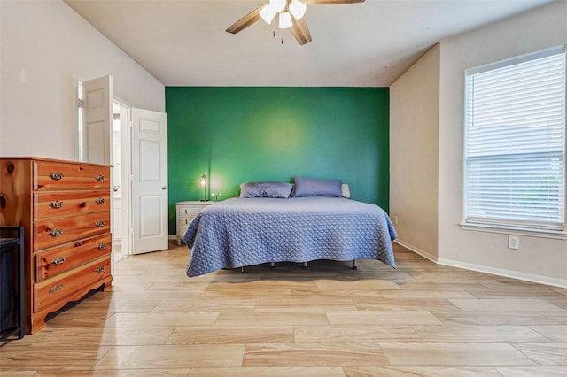 2961 Autumn Brook Ln, League City, TX 77573 - bedroom featuring light wood finished floors and ceiling fan