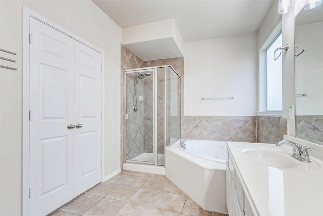 2961 Autumn Brook Ln, League City, TX 77573 - full bathroom featuring a garden tub, a shower stall, vanity, and tile patterned floors