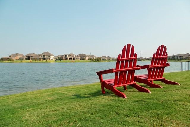 18326 Symons Branch Ct, Cypress, TX 77433 - dock with a yard, a water view, and a residential view