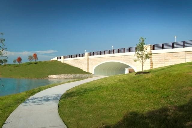 18326 Symons Branch Ct, Cypress, TX 77433 - view of home's community featuring a lawn and a water view