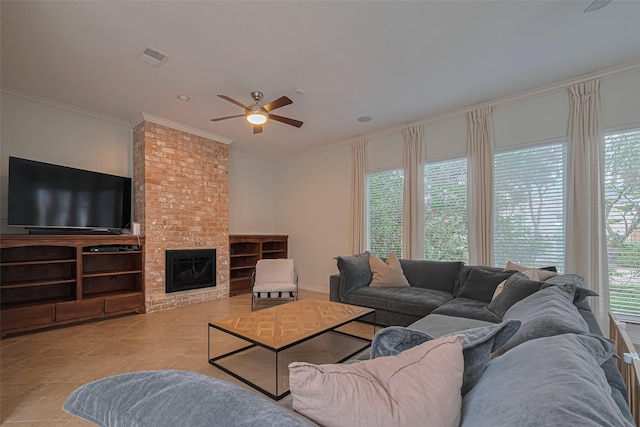 11914 Ashmead Dr, Houston, TX 77077 - living area with crown molding, a ceiling fan, tile patterned floors, and a brick fireplace
