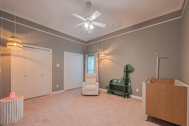 11914 Ashmead Dr, Houston, TX 77077 - living area featuring ornamental molding, carpet flooring, and a ceiling fan