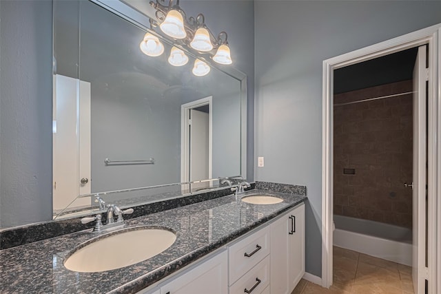 11914 Ashmead Dr, Houston, TX 77077 - full bath with double vanity, shower / tub combination, and tile patterned floors
