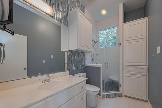 11914 Ashmead Dr, Houston, TX 77077 - bathroom featuring vanity, a shower stall, and tile patterned floors