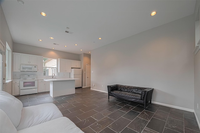 11914 Ashmead Dr, Houston, TX 77077 - living room featuring recessed lighting