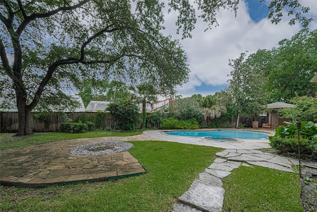 11914 Ashmead Dr, Houston, TX 77077 - view of swimming pool with a fenced backyard, a patio, and a pool with connected hot tub
