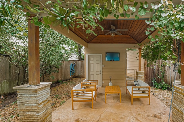 11914 Ashmead Dr, Houston, TX 77077 - fenced backyard featuring a ceiling fan, a patio area, and outdoor lounge area