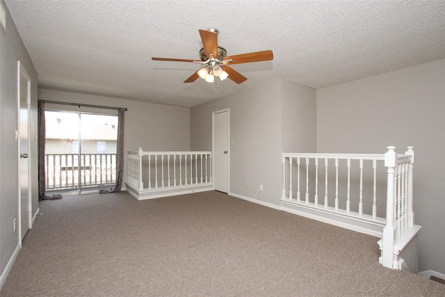 10615 Briar Forest Dr Unit 402, Houston, TX 77042 - carpeted spare room featuring a ceiling fan and a textured ceiling
