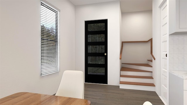 2720 Spence Rd, Houston, TX 77093 - foyer entrance featuring stairway and wood finished floors