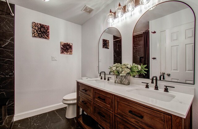 2516 Vaughn St, Houston, TX 77093 - full bath with marble look tiles, double vanity, and curtained shower