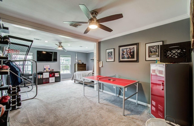 2516 Vaughn St, Houston, TX 77093 - recreation room with ceiling fan, carpet floors, and ornamental molding