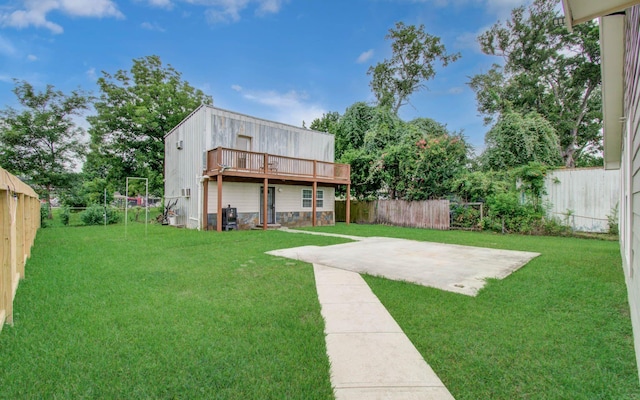 2516 Vaughn St, Houston, TX 77093 - fenced backyard featuring a patio and a deck